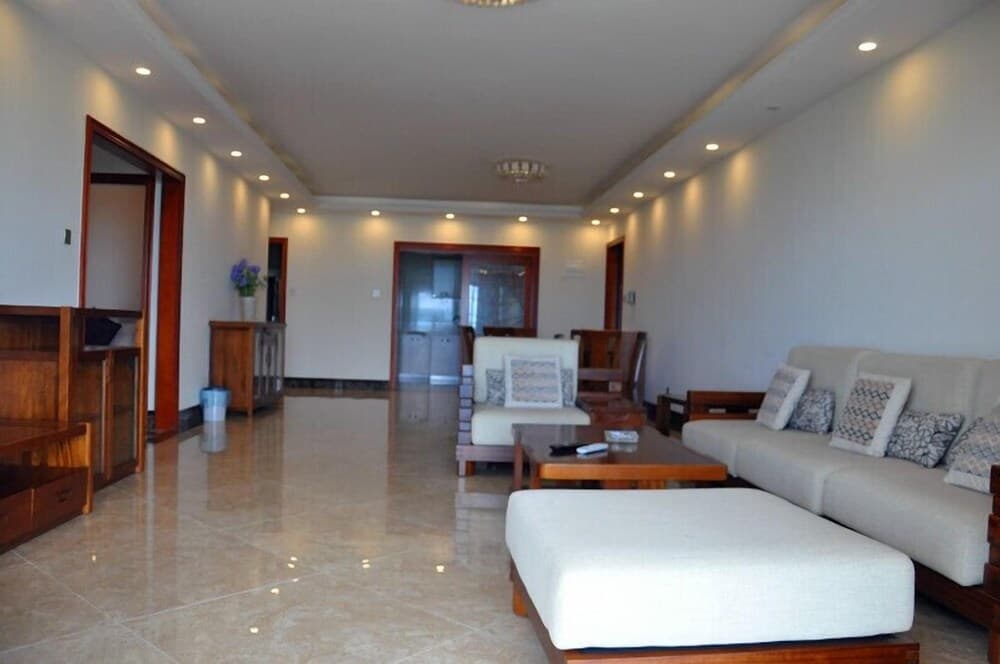Sanya Chunting Holiday Apartment - Санья